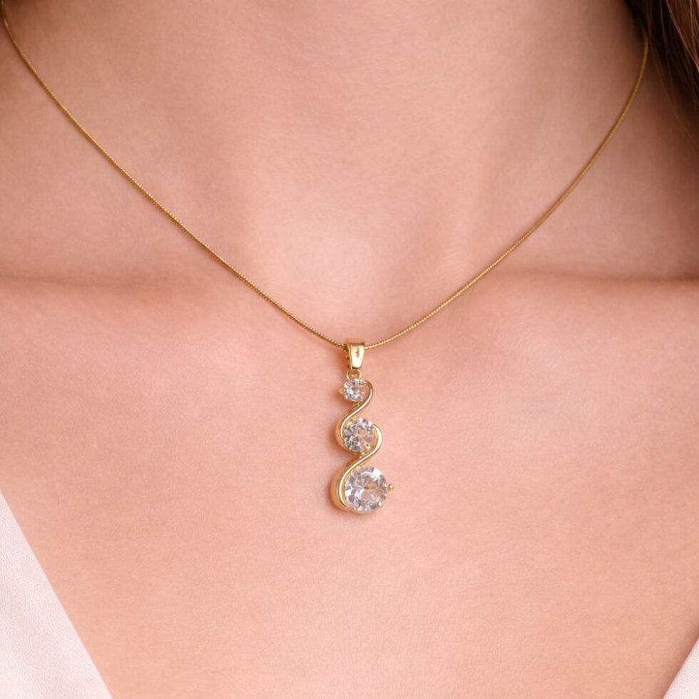 Elegant Triple Stone Curved Crystal Pendant Necklace with Gold Finish