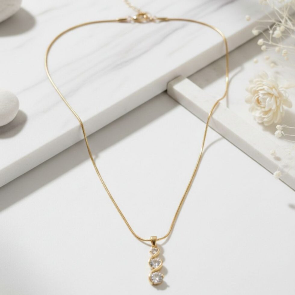 Elegant Triple Stone Curved Crystal Pendant Necklace with Gold Finish