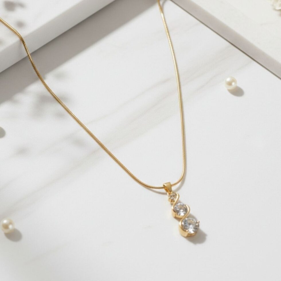 Elegant Triple Stone Curved Crystal Pendant Necklace with Gold Finish